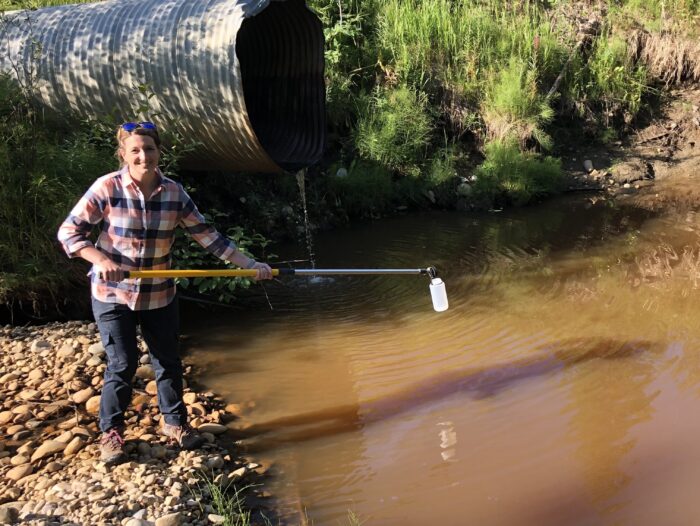 Environmental Scientist Heather Veilleux in the field.