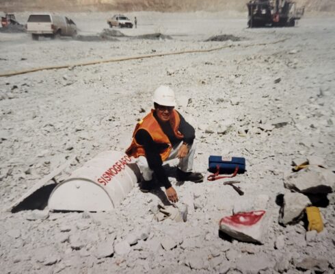 Alipio monitors blast rock fragmentation with a seismographer back in 2000.